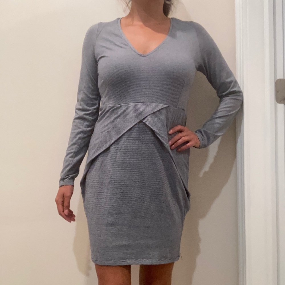 Long sleeve cocktail dress. Stripped pattern. M